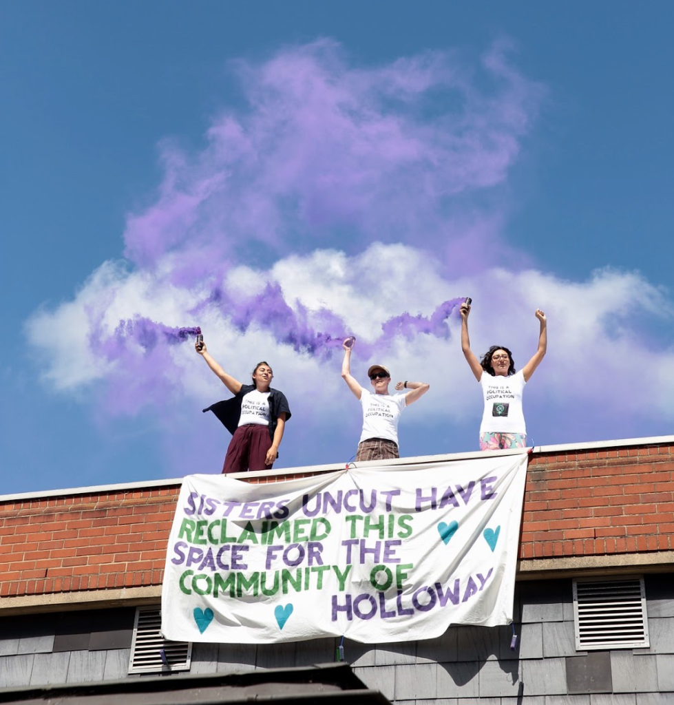 Sisters Uncut activists on the roof of old Holloway Prison visitor's centre, 27/05/2017. 